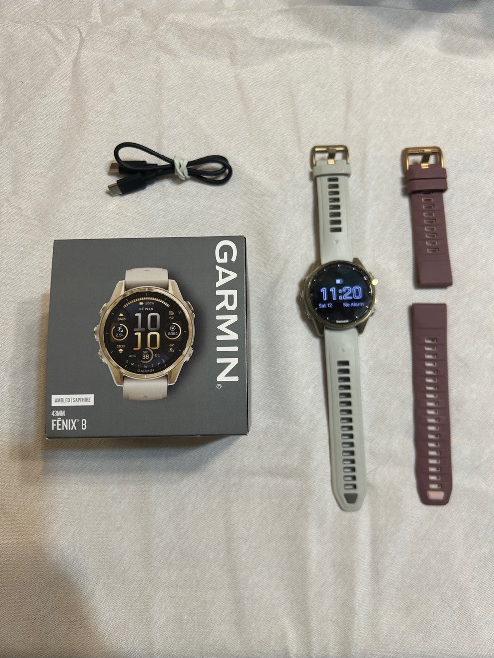 garmin Fenix 8 Smartwatch in Light Gray with Plum Bands